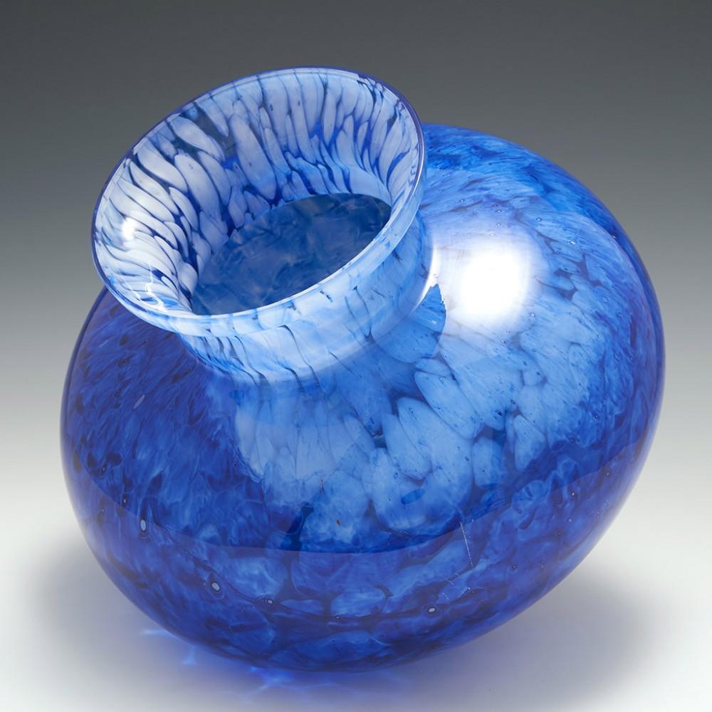 A Very Large Andre Delatte Glass Vase, c1925

Additional information:
Date : Circa 1925
Origin : Nancy, France
Bowl Features : Compressed globular form with short collar neck and everted rim,  Internal white mottled glass case in sapphire blue