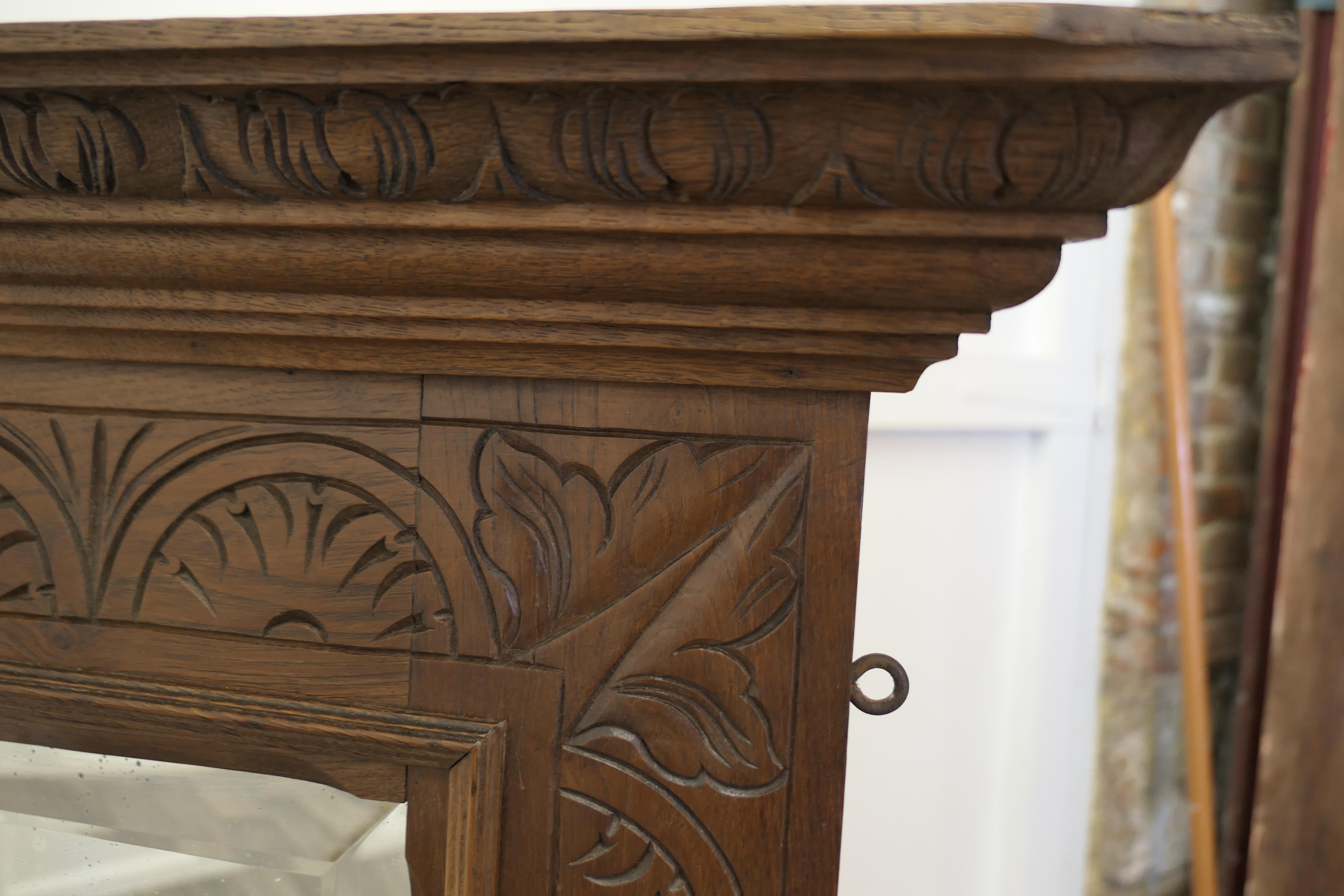 A Very Large Carved Oak Overmantel or Wall Mirror     1
