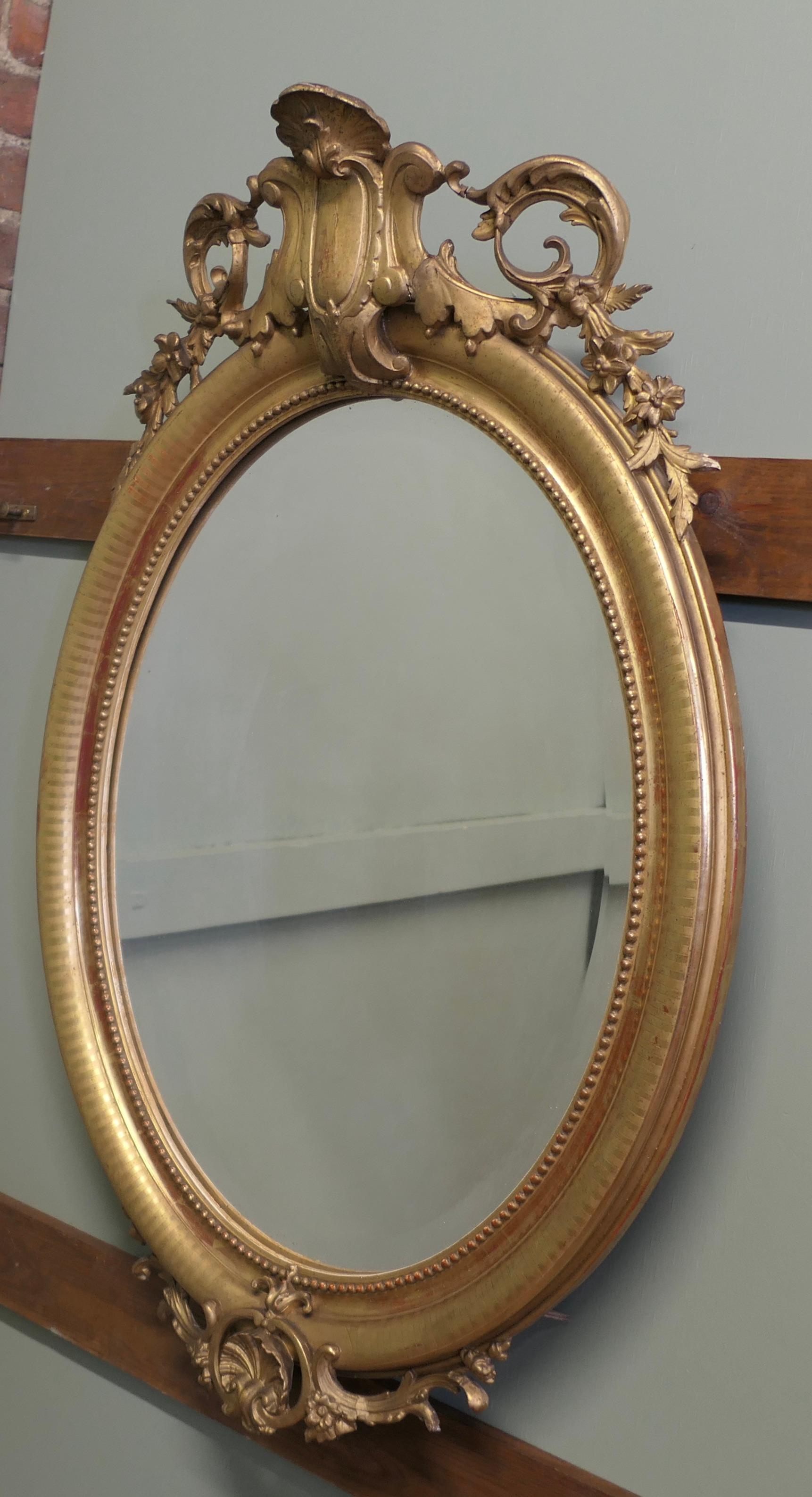 Espejo de pared ovalado dorado French Rococo muy grande en venta 1