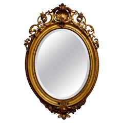 Espejo de pared ovalado dorado French Rococo muy grande
