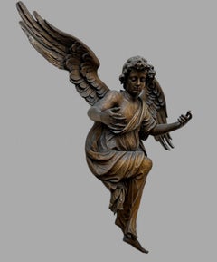 A Very Large Late 17th Century Flemish Oak Figure of Winged Angel