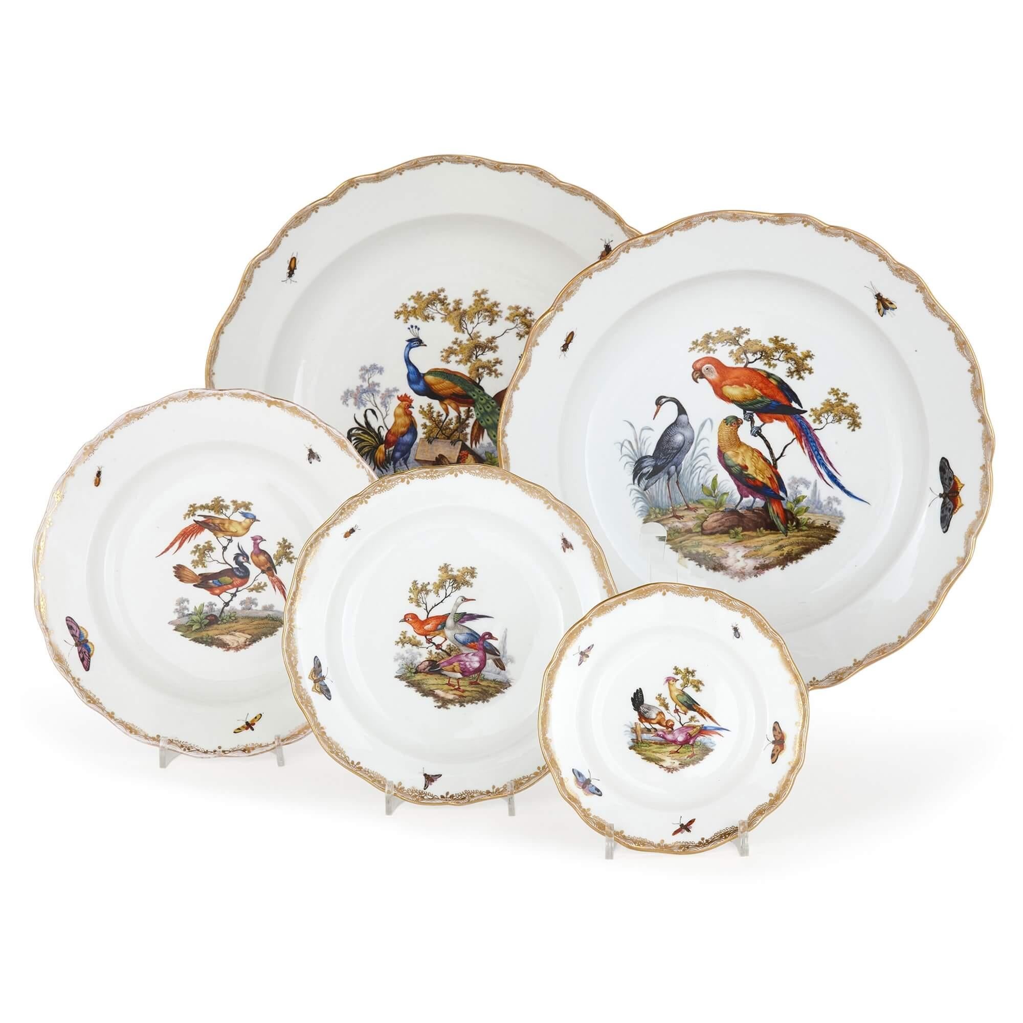 A very large Meissen porcelain dinner service
German, Late 19th Century
Largest dish: Height 6cm, width 57.5cm, depth 38cm
Smallest plate: Height 2.5cm, diameter 15cm

This stunning and expansive dinner service by the Meissen porcelain manufactory
