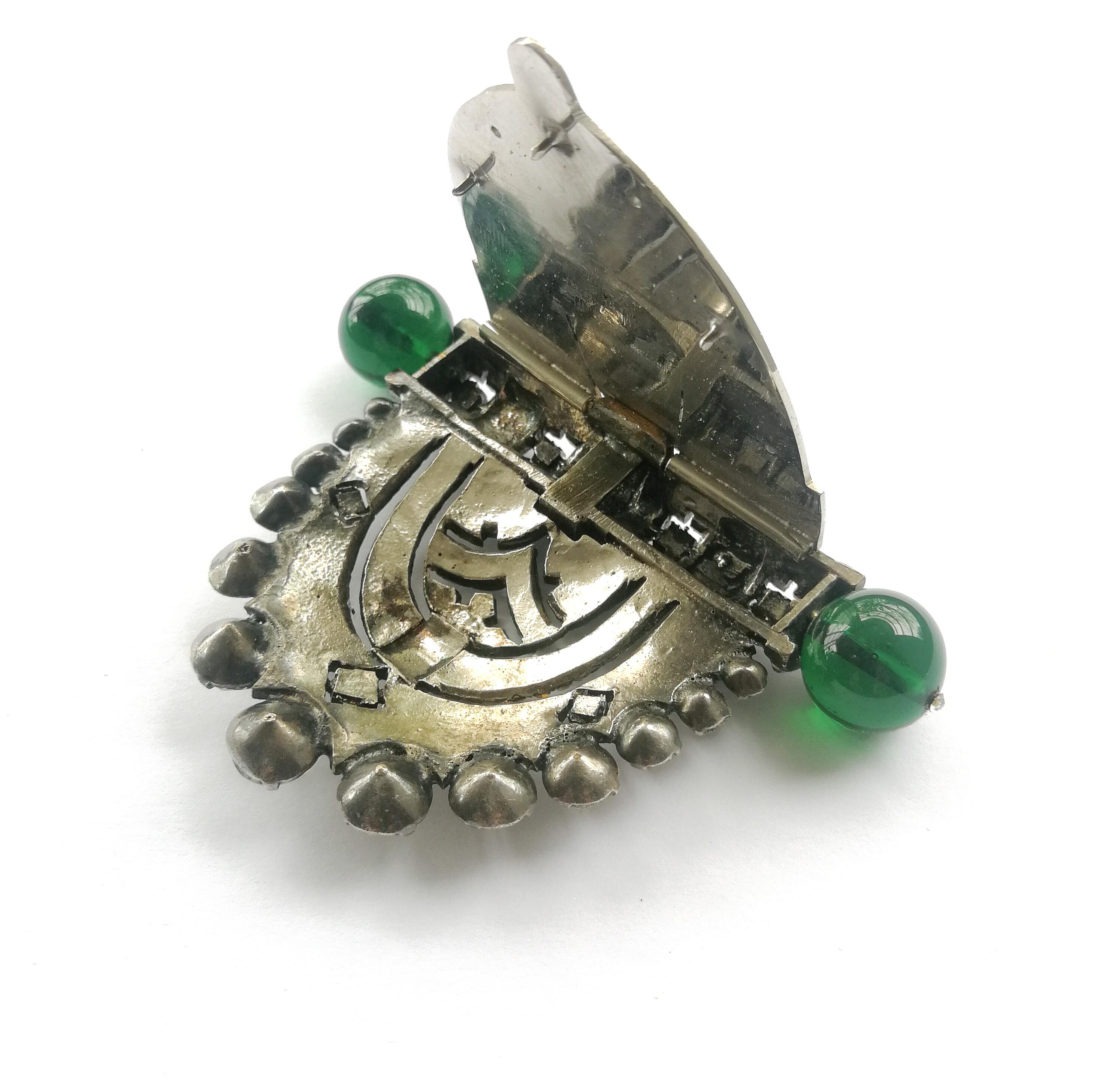A very large metal, clear and emerald paste Art Deco clip, Renel, France, 1930s 1