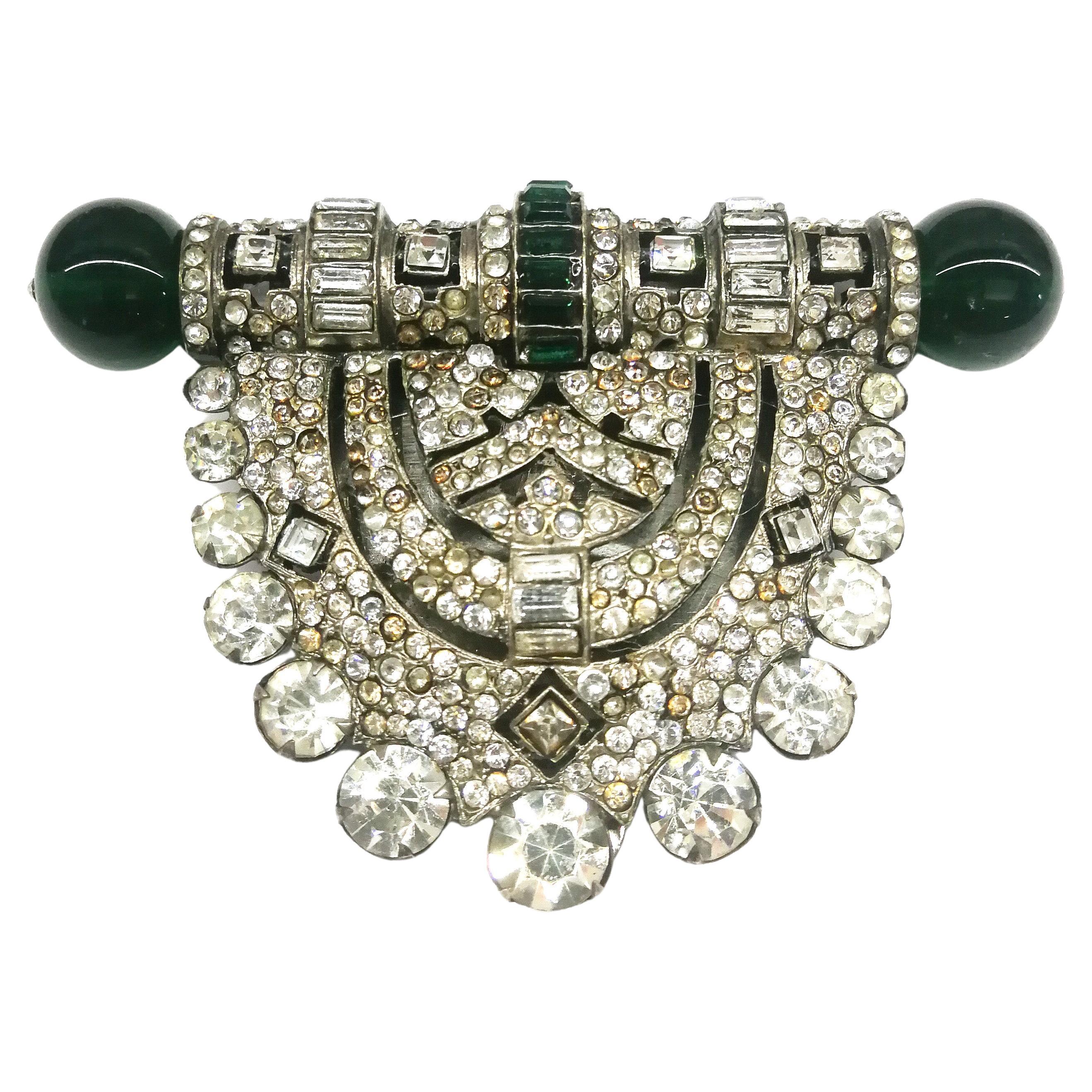 A very large metal, clear and emerald paste Art Deco clip, Renel, France, 1930s
