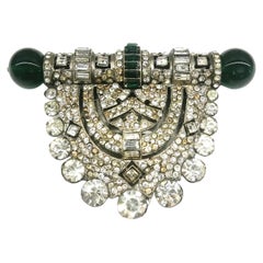 A very large metal, clear and emerald paste Art Deco clip, Renel, France, 1930s