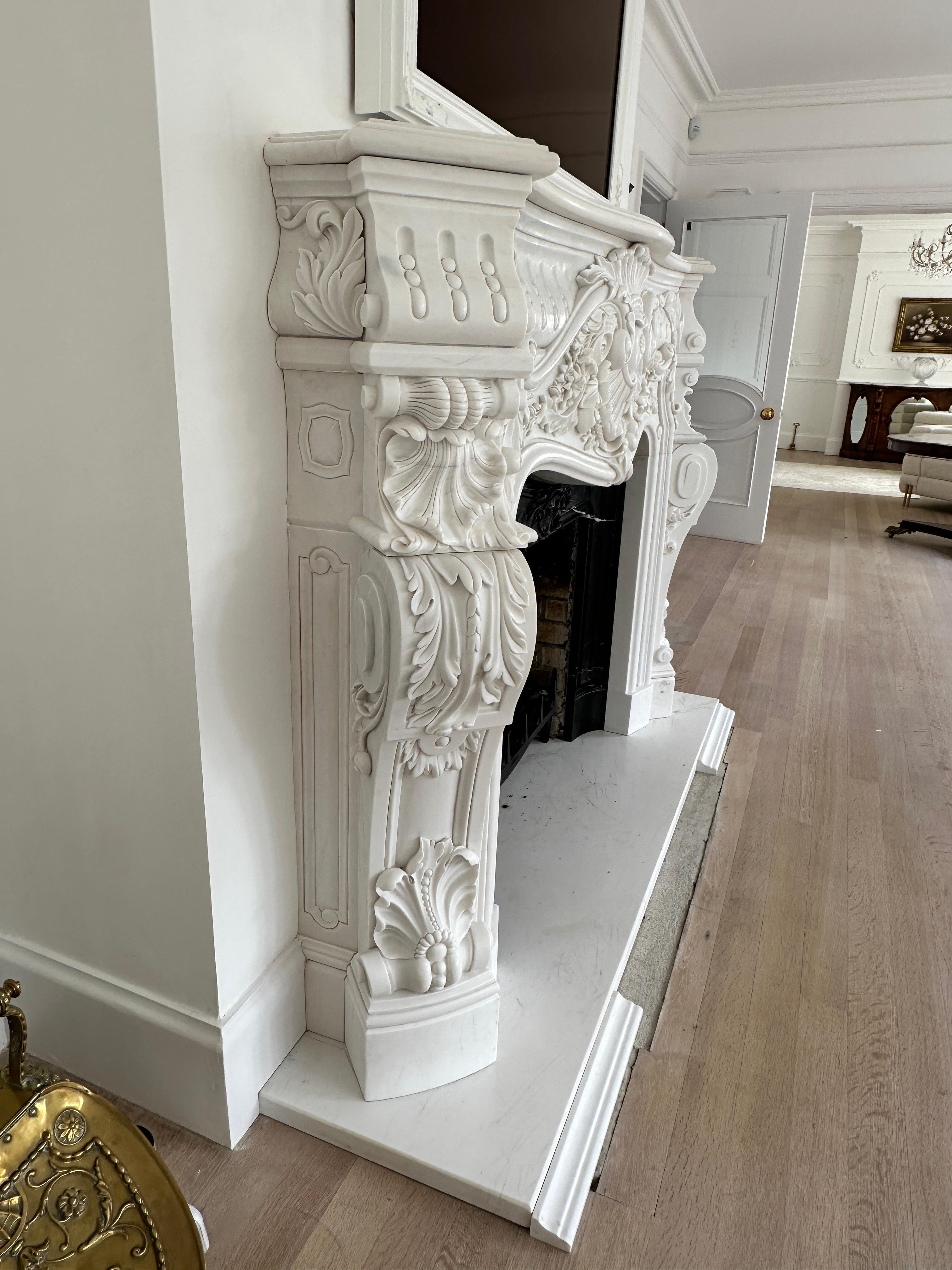European A Very large Reclaimed French Rococo White Marble Fireplace For Sale