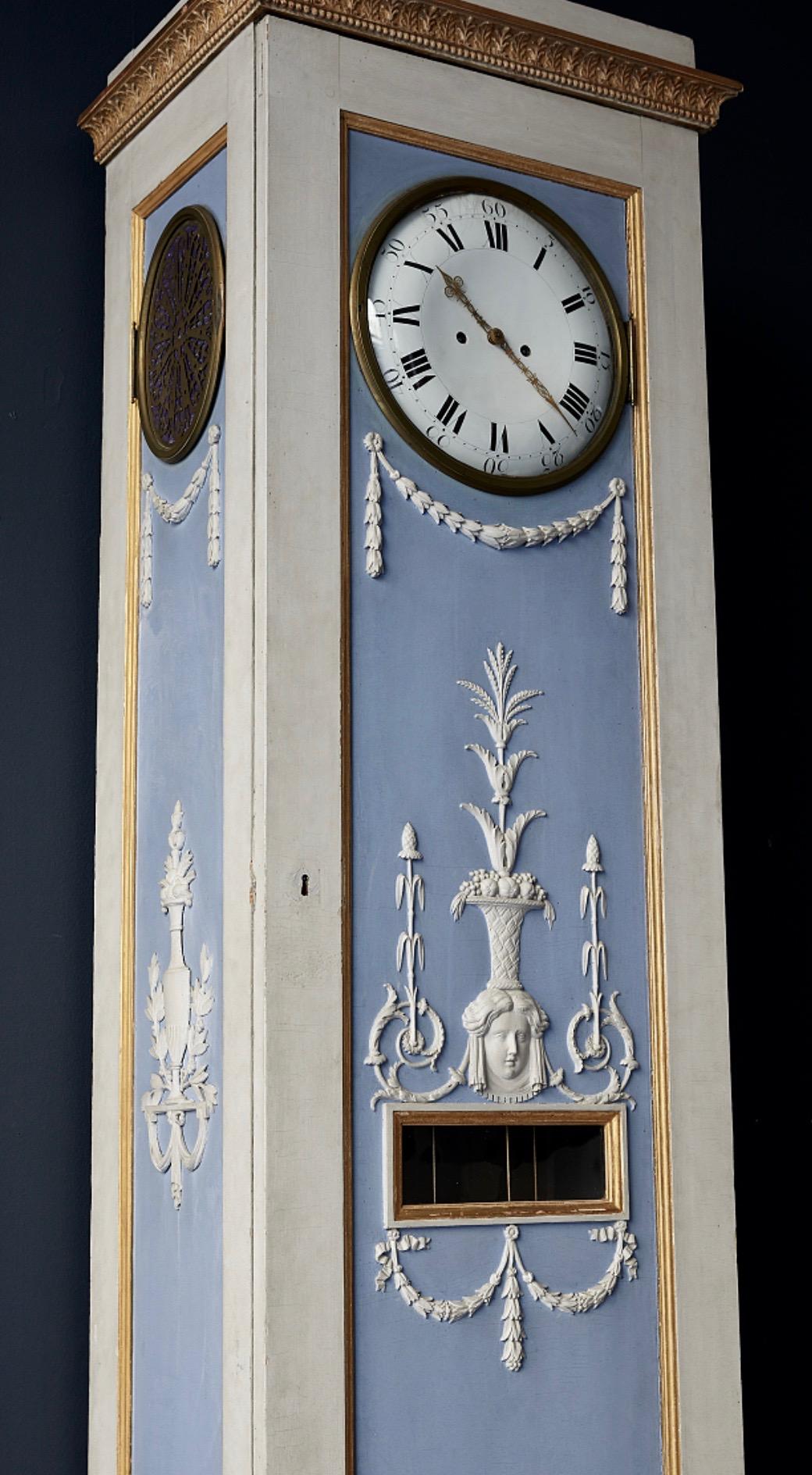 A very rare Swedish musical clock by Pehr Strand (1758-1826). There are 13 musical scrolls that comes with the clock. The painted case is attributed to Pehr Ljung (1743-1819)

The delicate blue and white painted decoration case of this superb