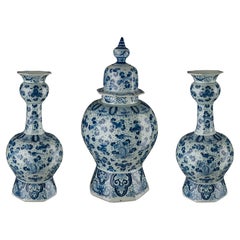 A very large three piece garniture with floral decor. Marked. Delft 1700-1716