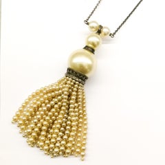 A very long silver, marcasite and paste pearl 'tassle' sautoir, France, 1920s