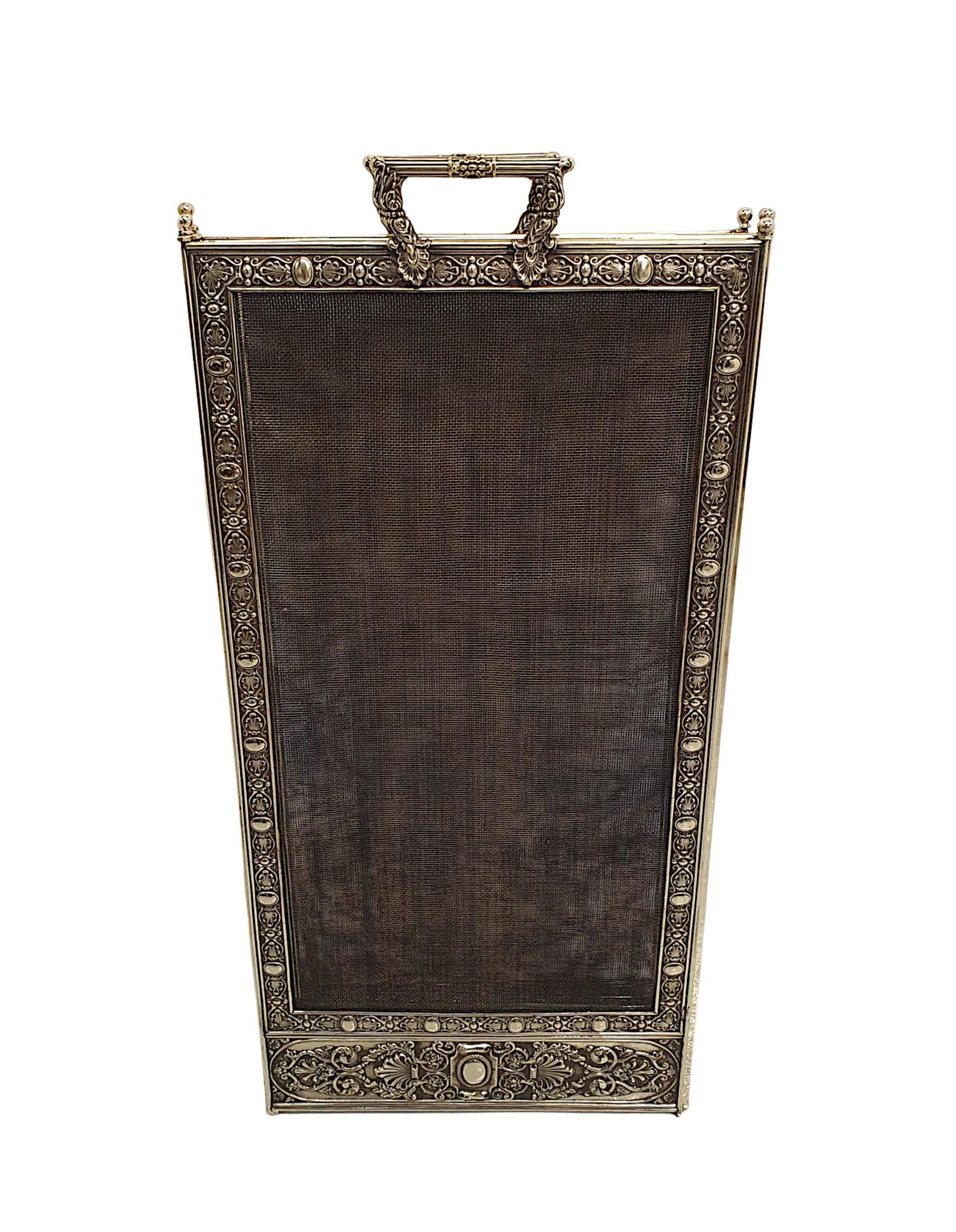 A very rare 19th Century finely cast polished brass four panel folding fire screen of large proportions, fully restored and of exceptional quality.  The protective wire mesh of rectangular form is set within four beautifully ornate, reeded polished