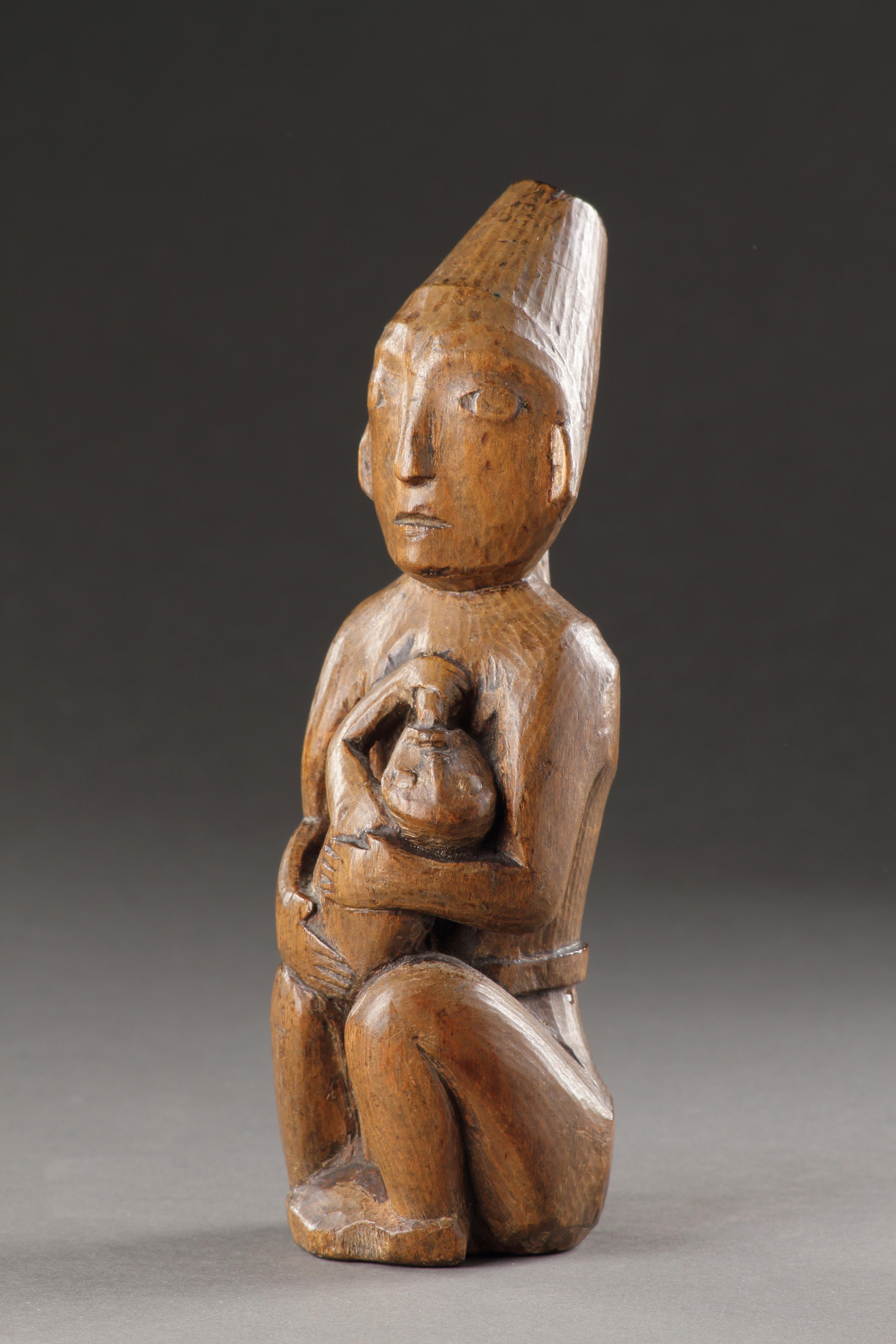 Canadian A Very Rare and Early Northwest Coast Maternity Figure For Sale