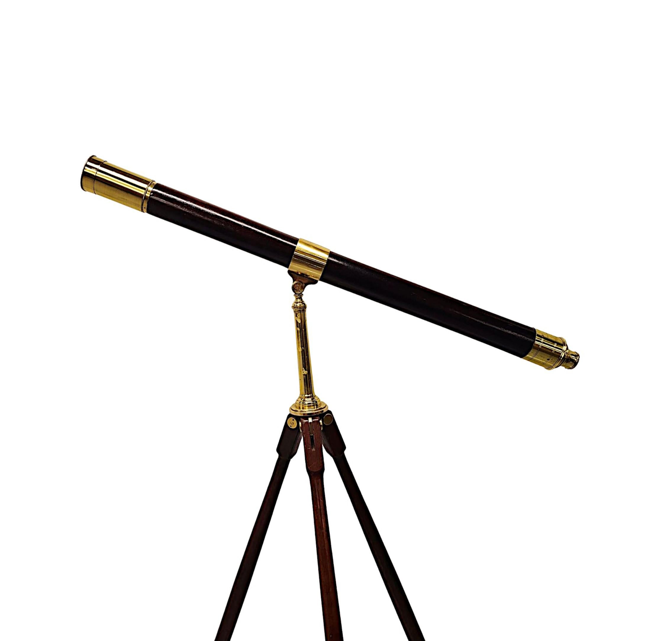 A very rare early 19th Century by Dolland, London, richly patinated mahogany and brass telescope, finely hand carved and of exceptional quality supported on a gorgeous brass and mahogany tripod base, stamped ‘Dolland, London’, circa 1830. 

Mahogany