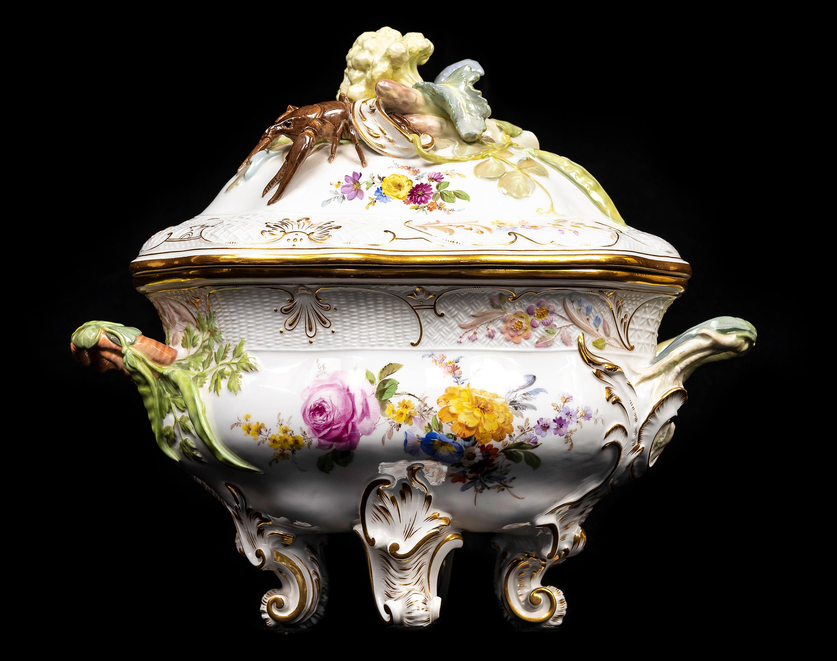 An Incredible and Very Rare Meissen Porcelain Tureen and Cover with Vegetable and Lobster Top. After the model from the 'Brühlsche Allerlei' service, painted with flower sprays, the tureen raised on four scroll feet and set with vegetable-form