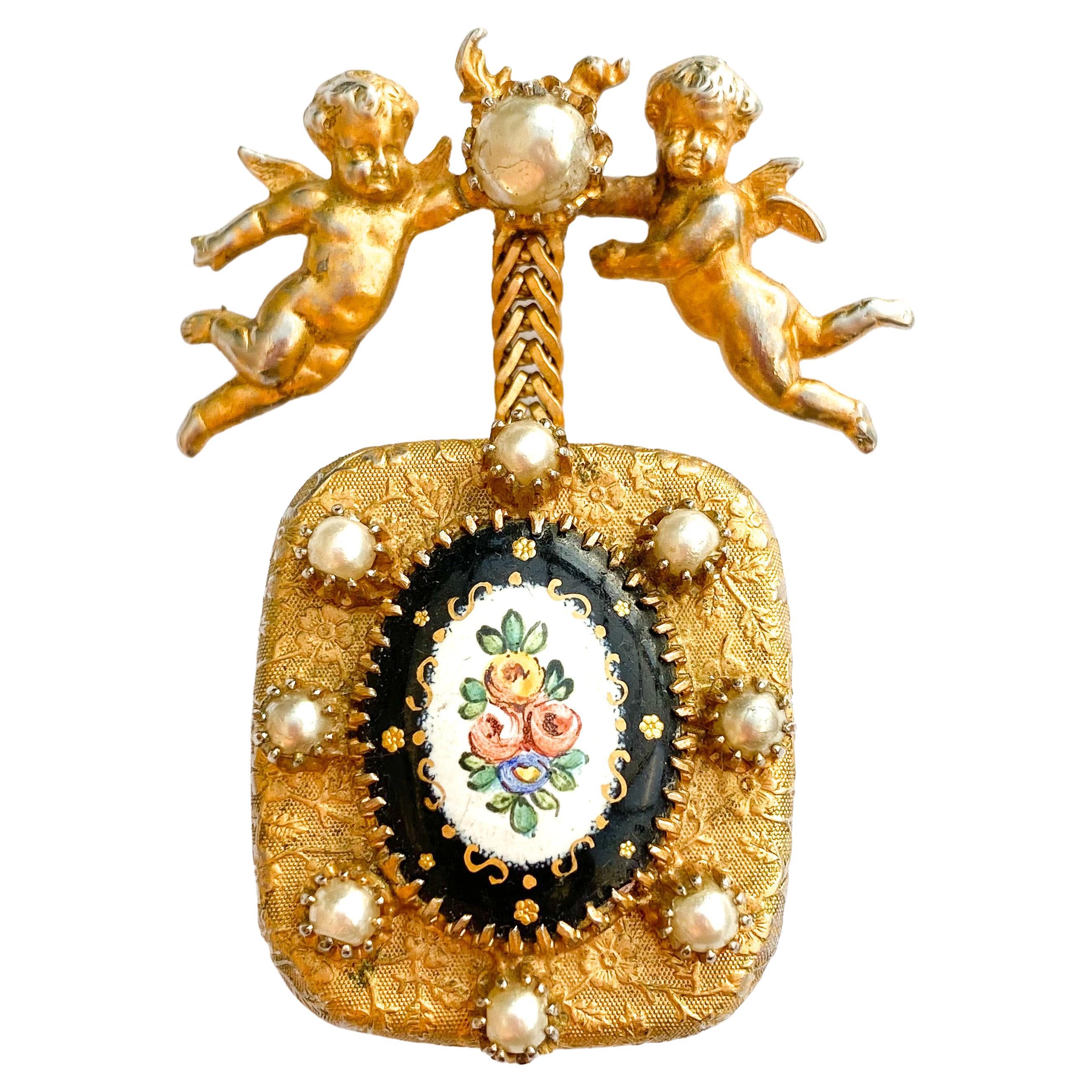 A very rare 
musical box
 pendant brooch, Christian Dior by Mitchel Maer, c1954.