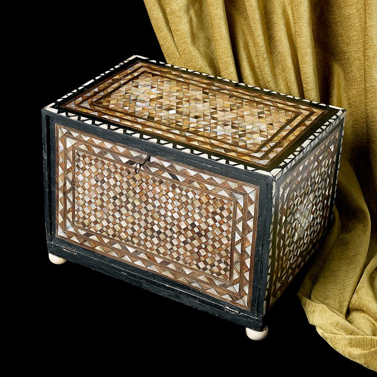 A very rare ottoman table box, the fall front opens to reveal an arrangement of 7 drawers; decorated throughout with differing patterns of tortoiseshell and mother of pearl; measures: approximate 17 1/2 inches wide, 12 1/2 inches high and 11 1/2