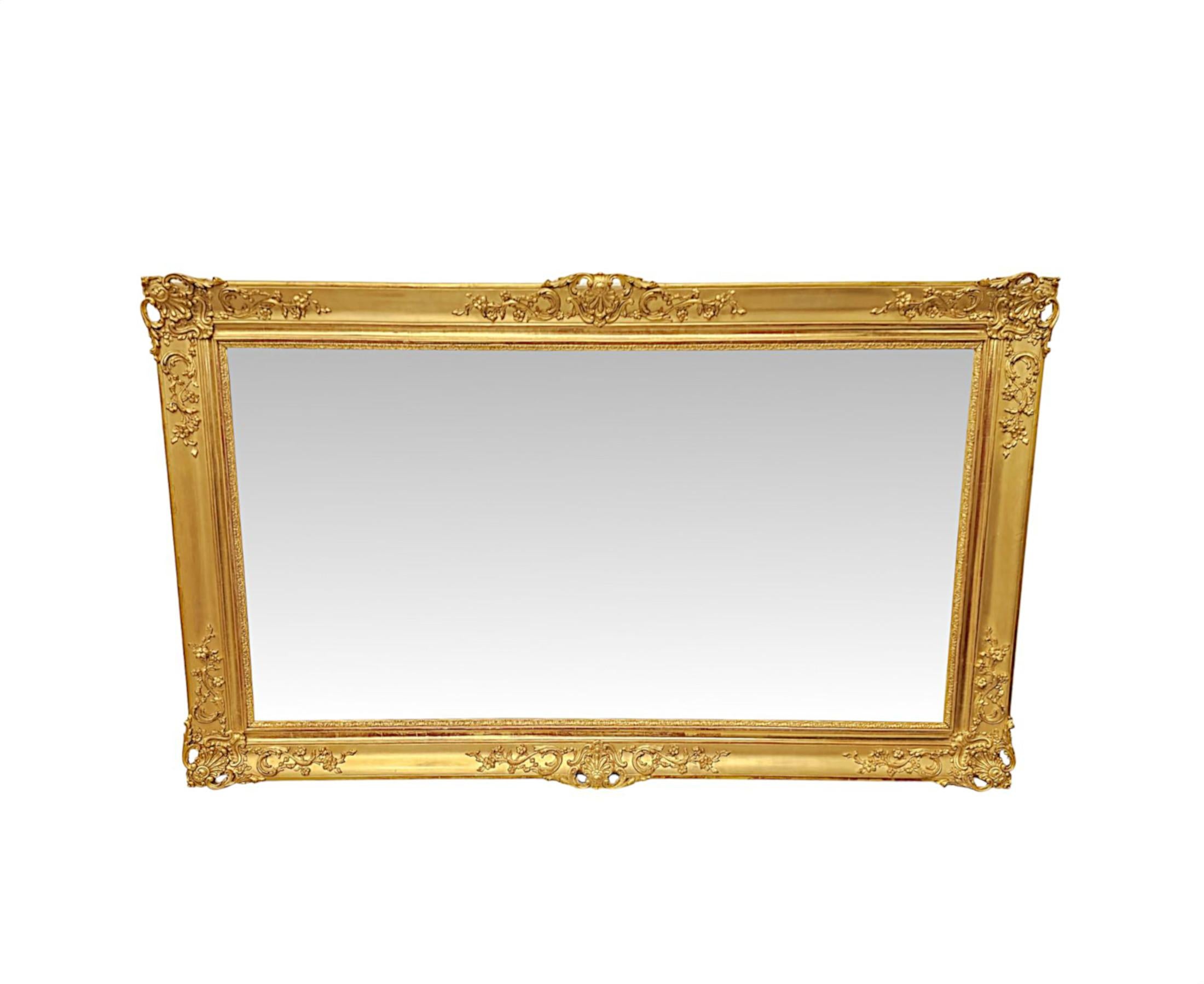 A very rare pair of 19th Century giltwood mirrors of exceptional quality.  This stunning pair of mirrors can be hung in both the landscape and portrait format.  The mirror glass plate of rectangular form is set within a finely hand carved, pierced