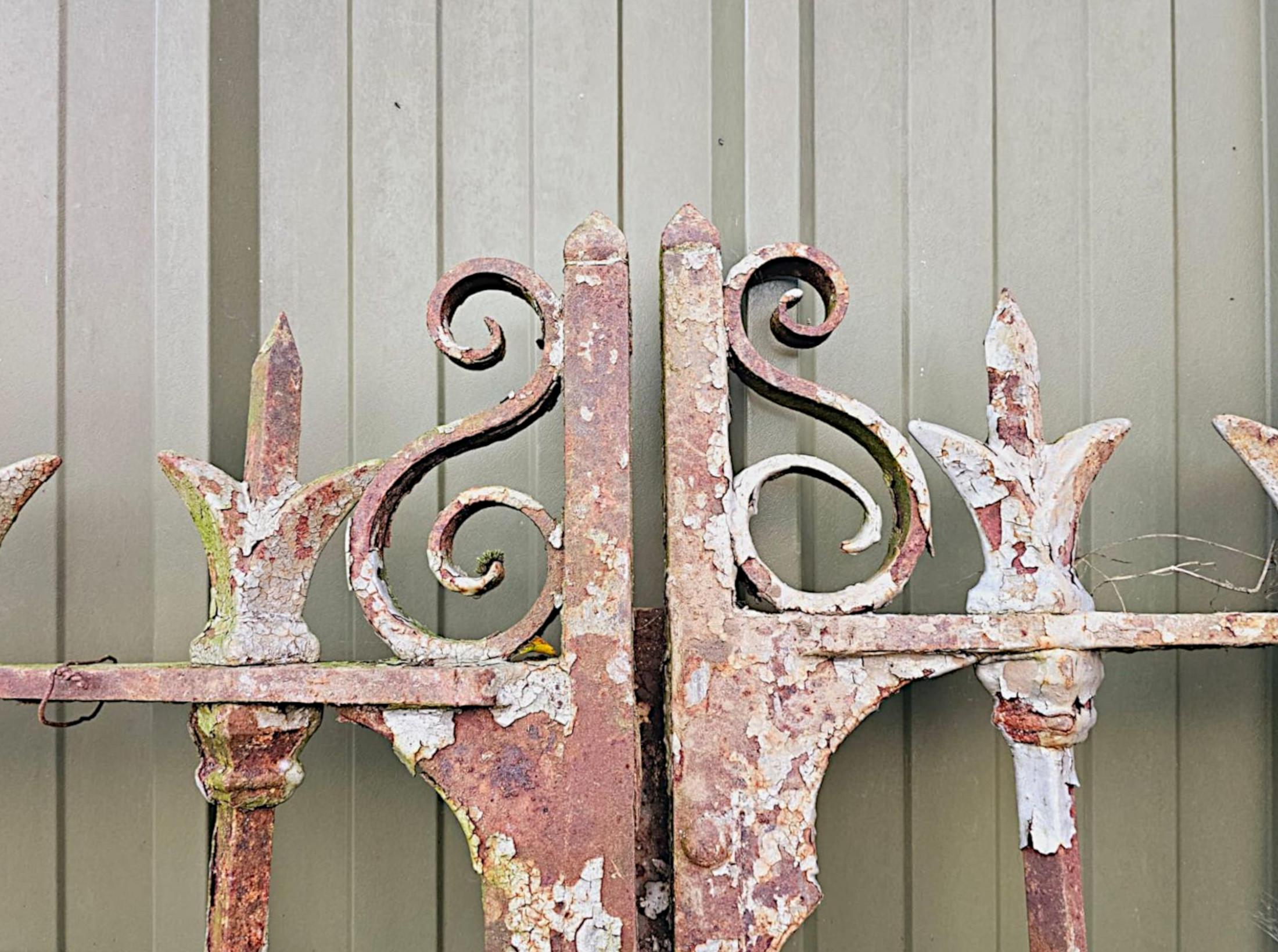 A very rare set of wrought iron 19th Century Estate entrance gates of large proportions.  This superb set of gates are of exceptional quality with decorative iron cast finials and scroll motif detail throughout.  

Provenance: Private Estate, Irish
