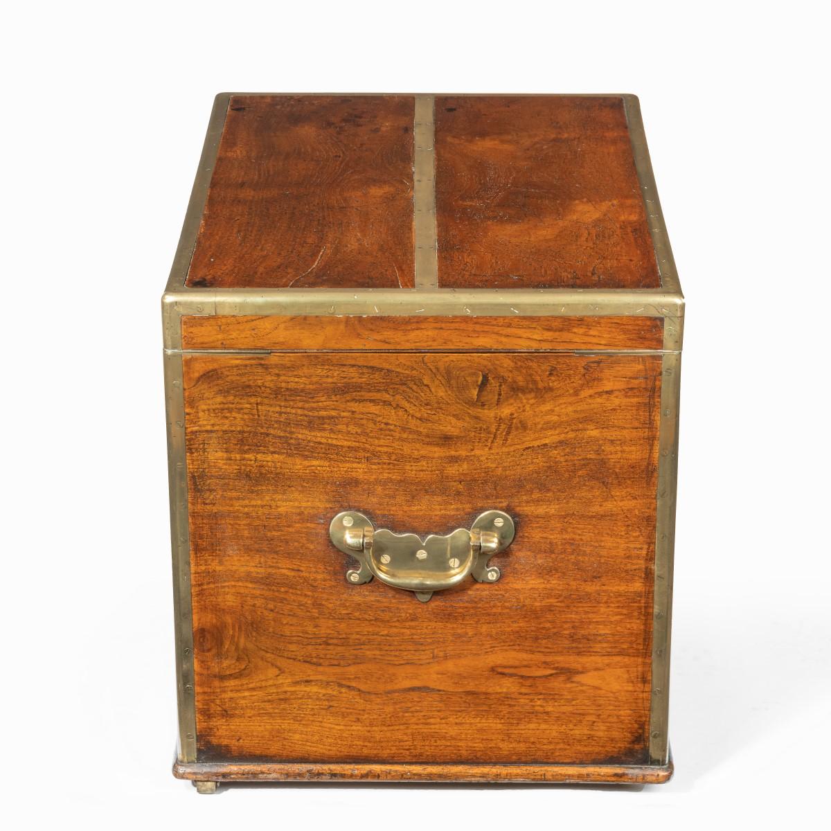 A very robust brassbound William IV Anglo-Chinese padouk silver chest, of rectangular form with a hinged lid and the original substantial brass carrying handles, the lock stamped ‘Barron WR Patent’. Circa 1830.

Footnote: In 1778 Robert Barron