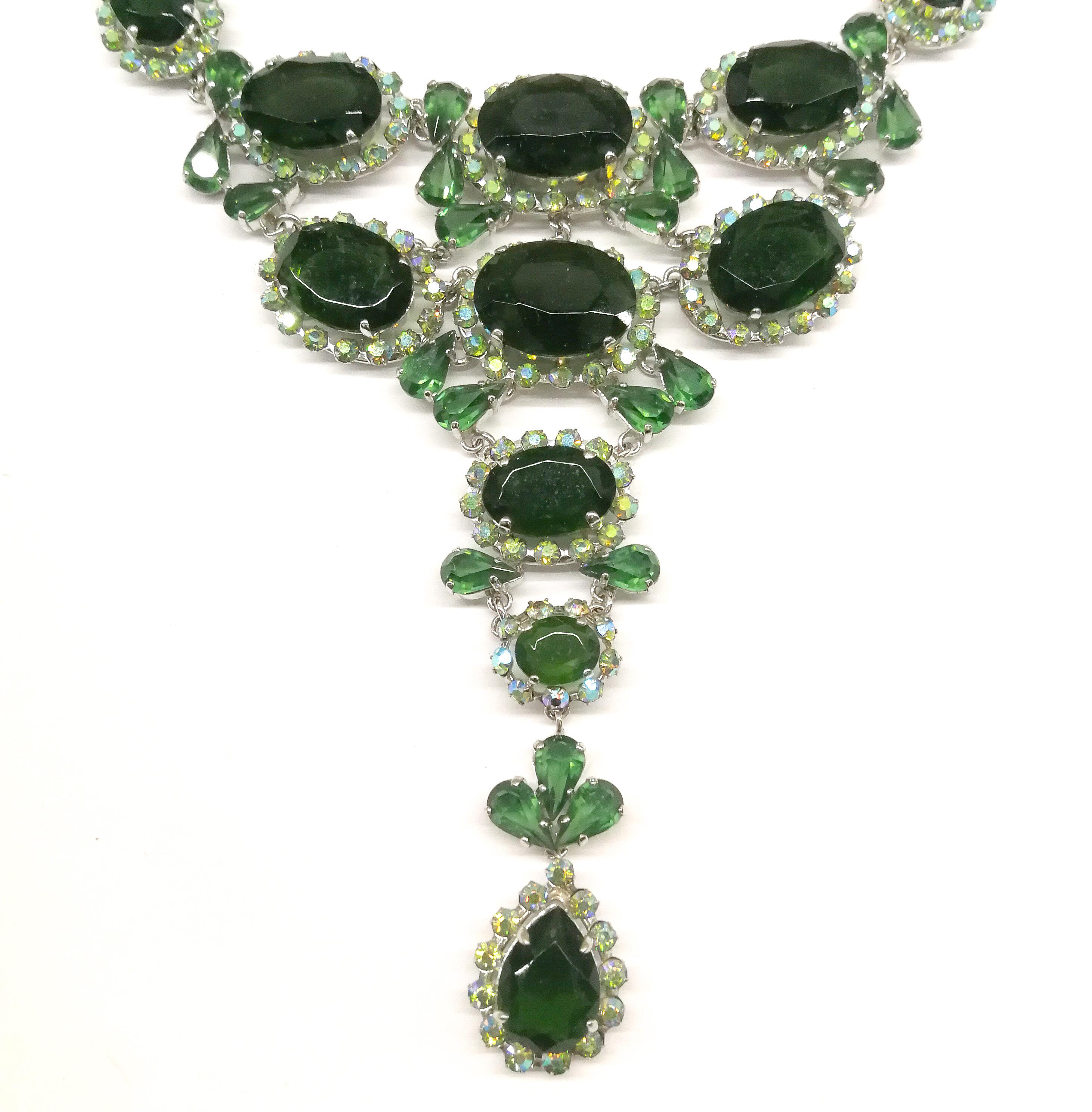 A very rare and spectacular necklace and earrings, made by Henkel and Grosse for Christian Dior from January, 1957. The iconic necklace and earrings are rarely seen together. A sumptuous and dramatic necklace is made with oval green tourmaline