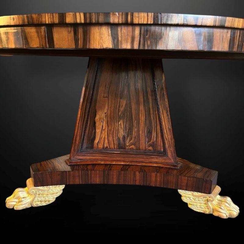 A very striking Regency Coromandel Centre Table with gilt paw feet. In Good Condition For Sale In Reepham, GB