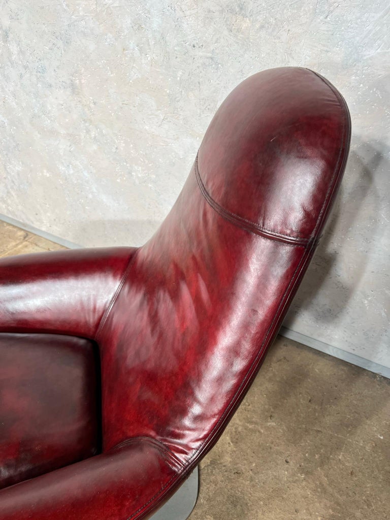 Very Stylish Vintage Deep Red Leather Swivel Chair and Stool 60 For