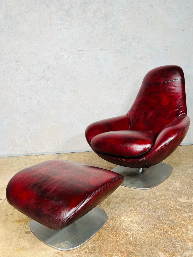 Very Stylish Vintage Deep Red Leather Swivel Chair and Stool 60 For
