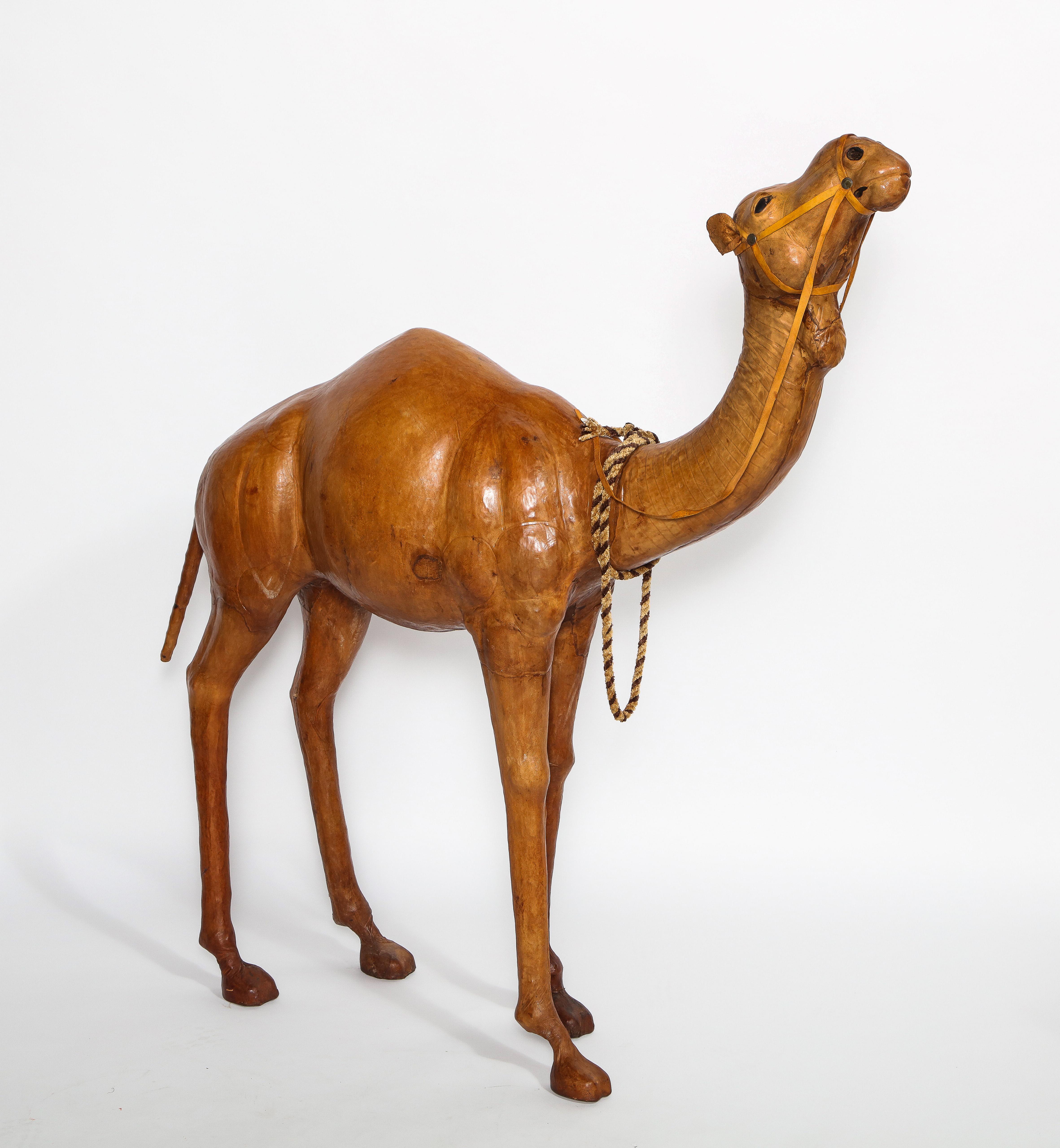 A Very Unusual and Rare French 1940s model of a Camel, made of natural tanned leather. This is truly an elaborate piece for any home decor. This piece is made of naturally tanned leather, all handstitched together with impressive craftsmanship.