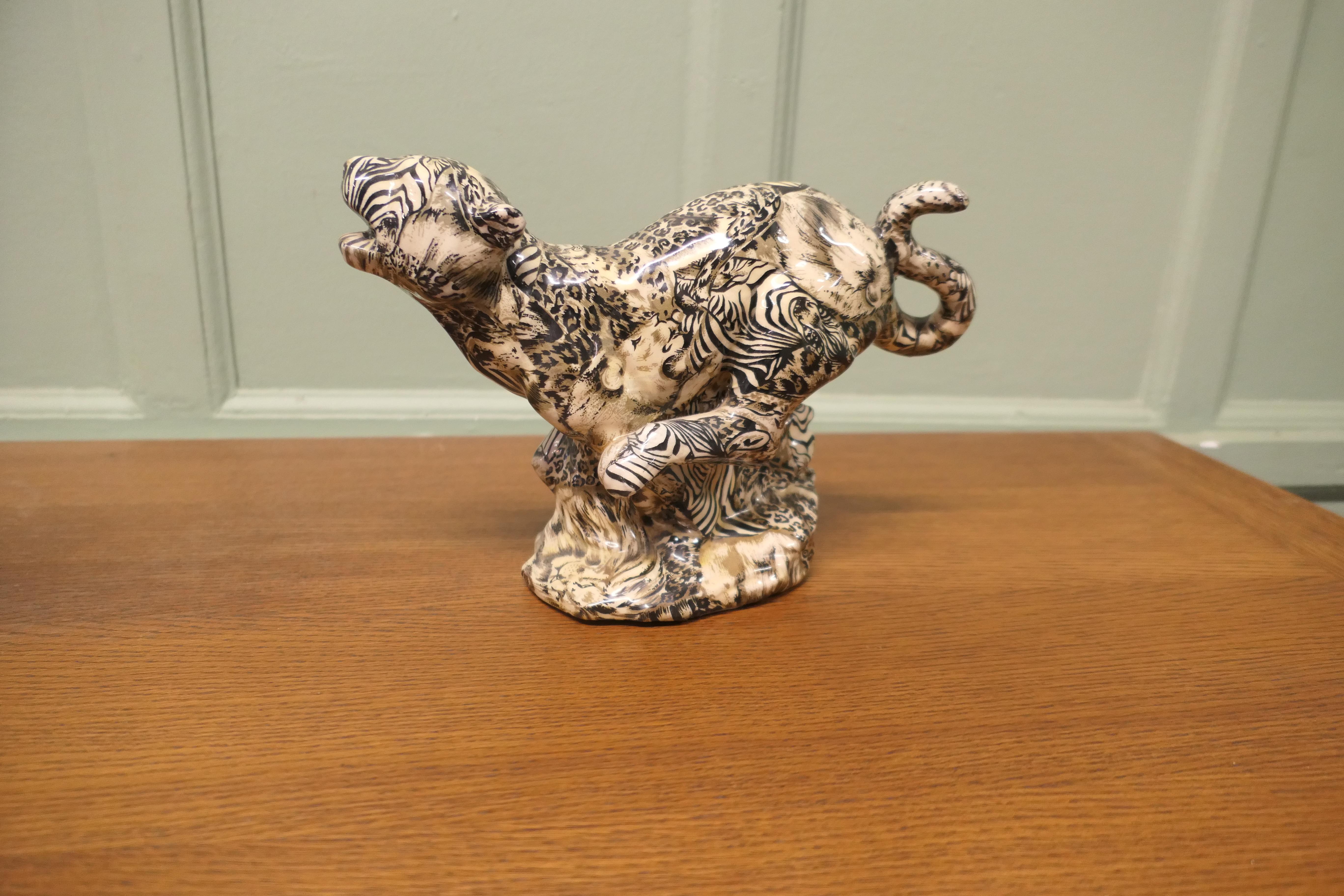 A Very Unusual Patchwork Collage Ceramic Cheetah 


This charming Cheetah is by La Vie Collage is from the Safari Collection it has a patchwork decoration of jungle animals 
This rare and charming piece is made of high-quality ceramic pottery, it is