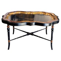 A very useful coffee table. A tray on stand.