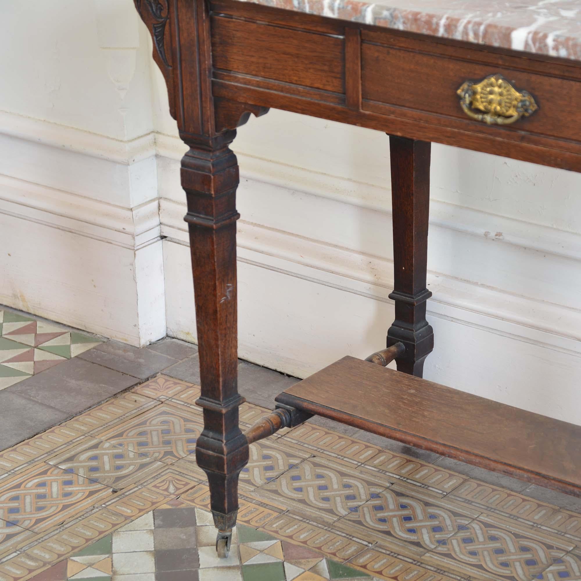 Marble A Victorian Aesthetic Movement marble topped table For Sale