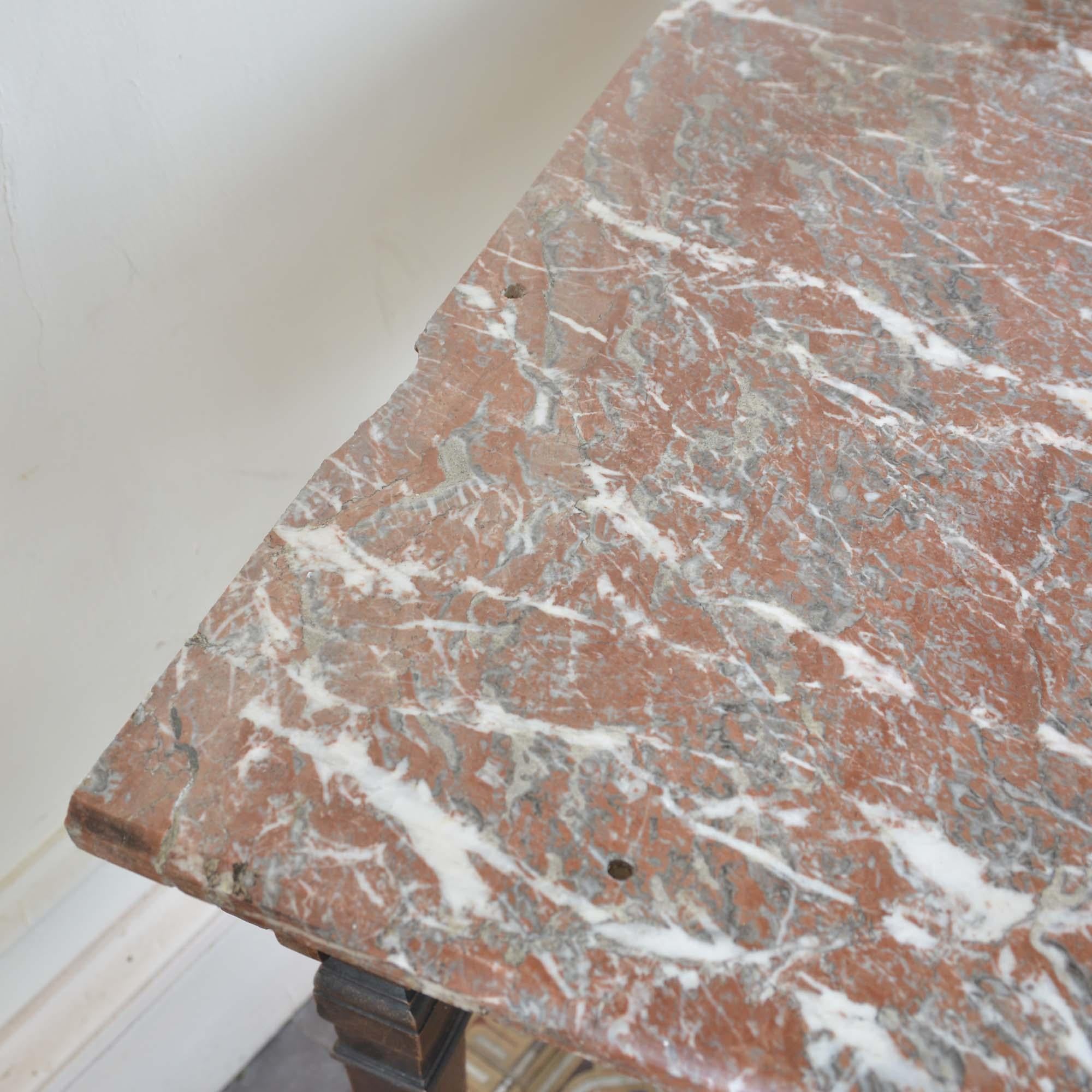 A Victorian Aesthetic Movement marble topped table For Sale 1