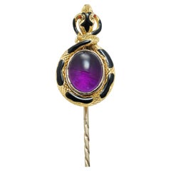 A Victorian Amethyst and Black Enamel Snake Stick-pin