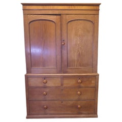 A Victorian Ash and Oak Linen Press  This is an appealing piece of furniture
