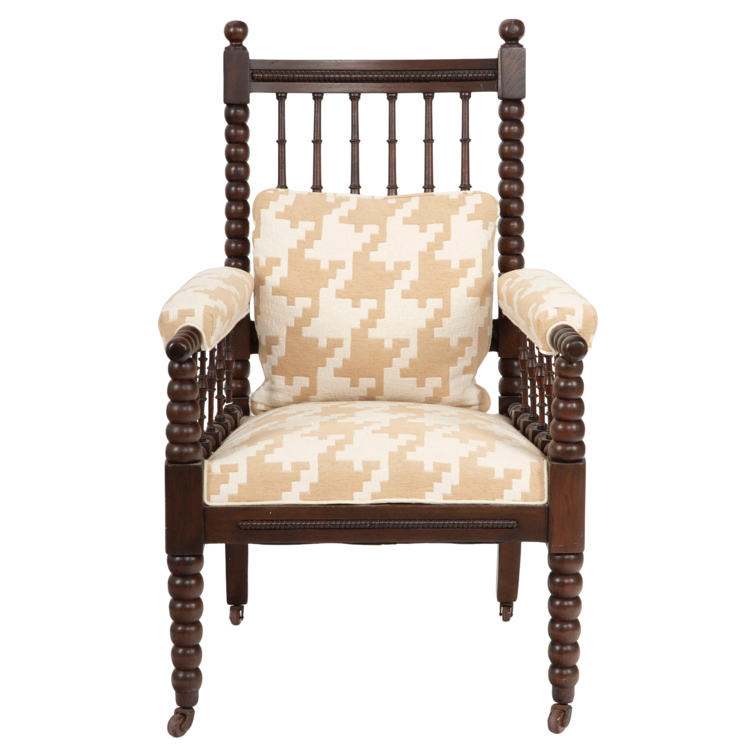 A Victorian Bobbin-Turned Armchair in Carved Oak For Sale