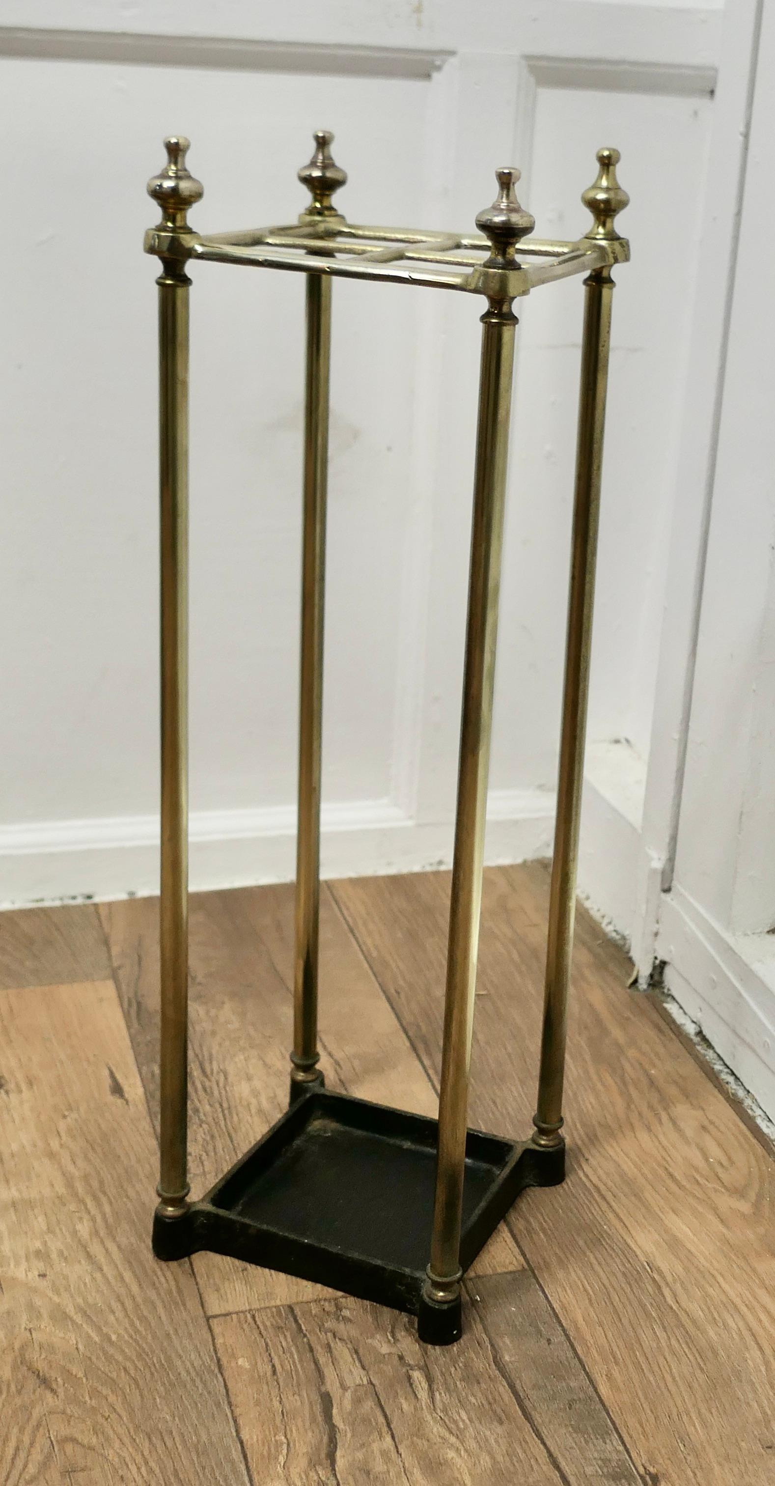 A Victorian Brass and Cast Iron Walking Stick Stand or Umbrella Stand

A charming piece, the stand has a brass top divided into 4 sections to hold either Walking Sticks or Umbrellas, the heavy iron base is also the drip tray 
The stand is 26” high,