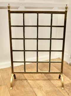 A Victorian Brass and Glass Art Nouveau Fire Screen