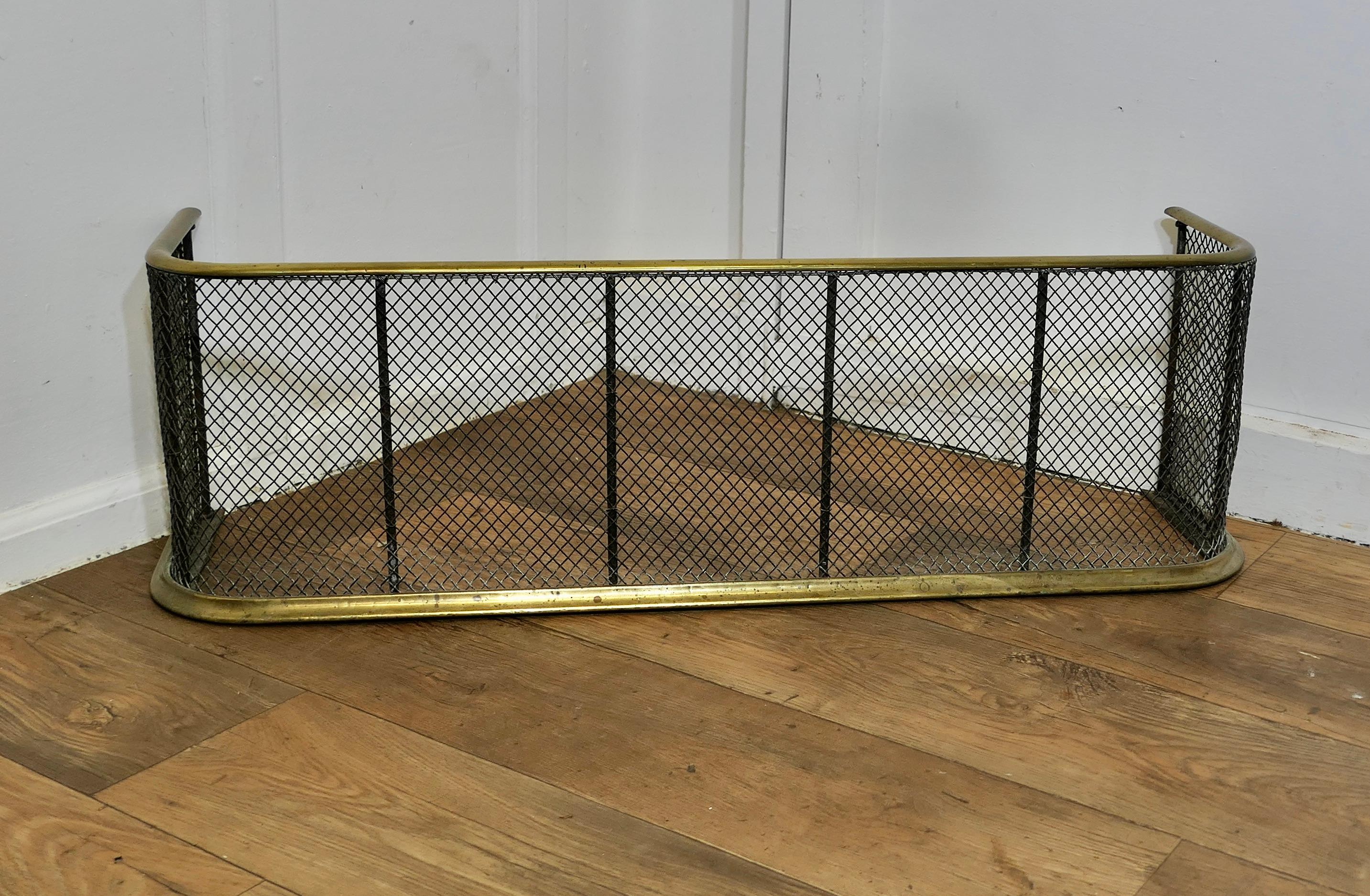 A Victorian Brass and Iron Fender or Fire Guard
 
A Victorian antique fire guard, the fender has heavy mesh infill with brass rails top and bottom it is in good all round condition 
The fender is 12” high, 10” deep and 39” long
TFB281