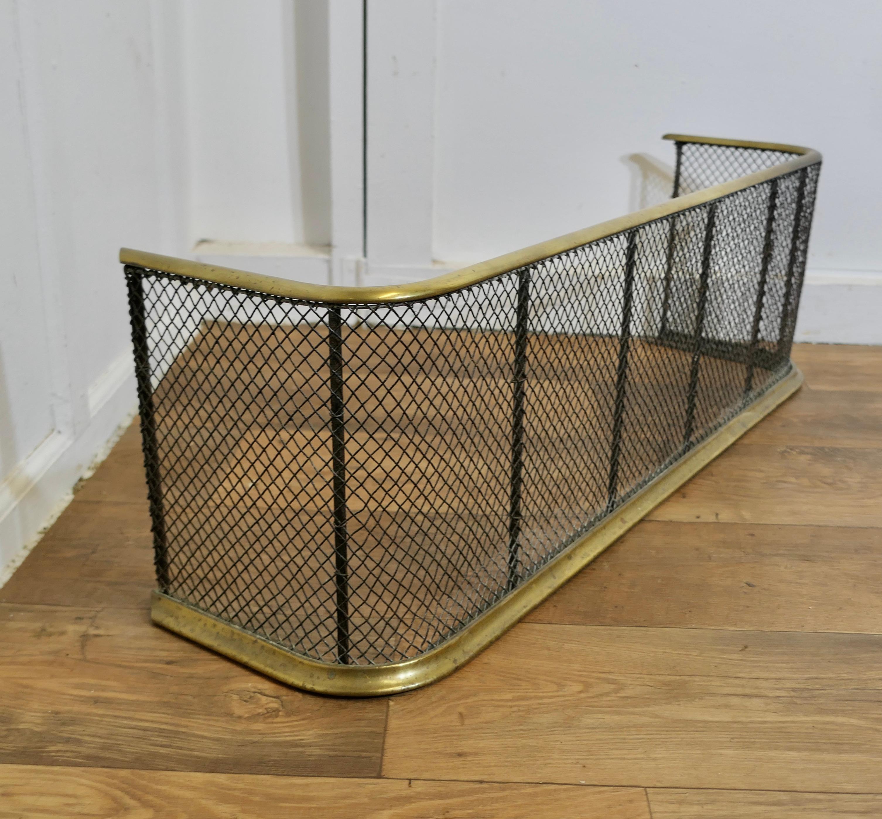 19th Century A Victorian Brass and Iron Fender or Fire Guard   A Victorian antique fire guard