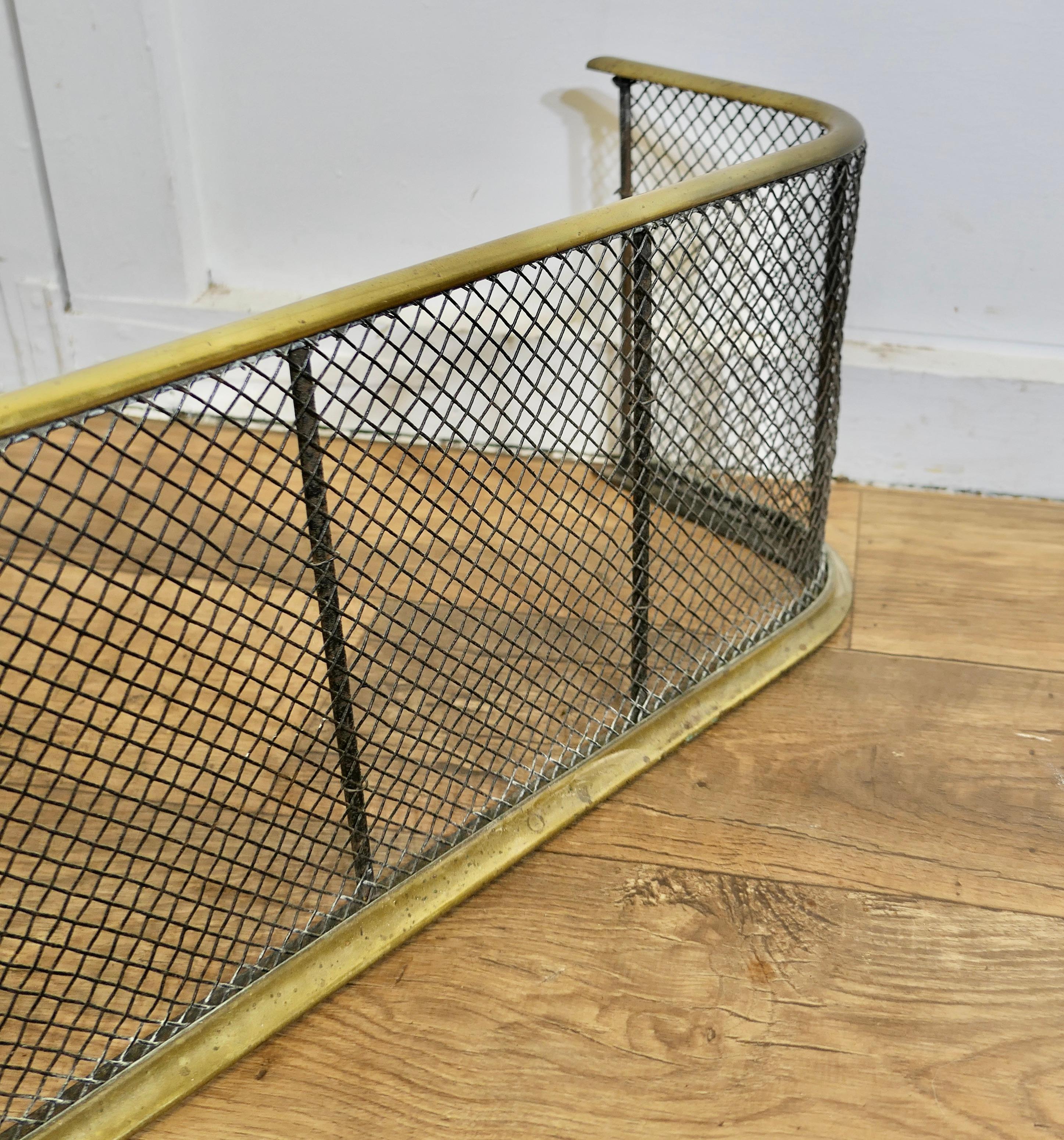 A Victorian Brass and Iron Fender or Fire Guard   A Victorian antique fire guard 2