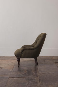 A Victorian Button Back Armchair