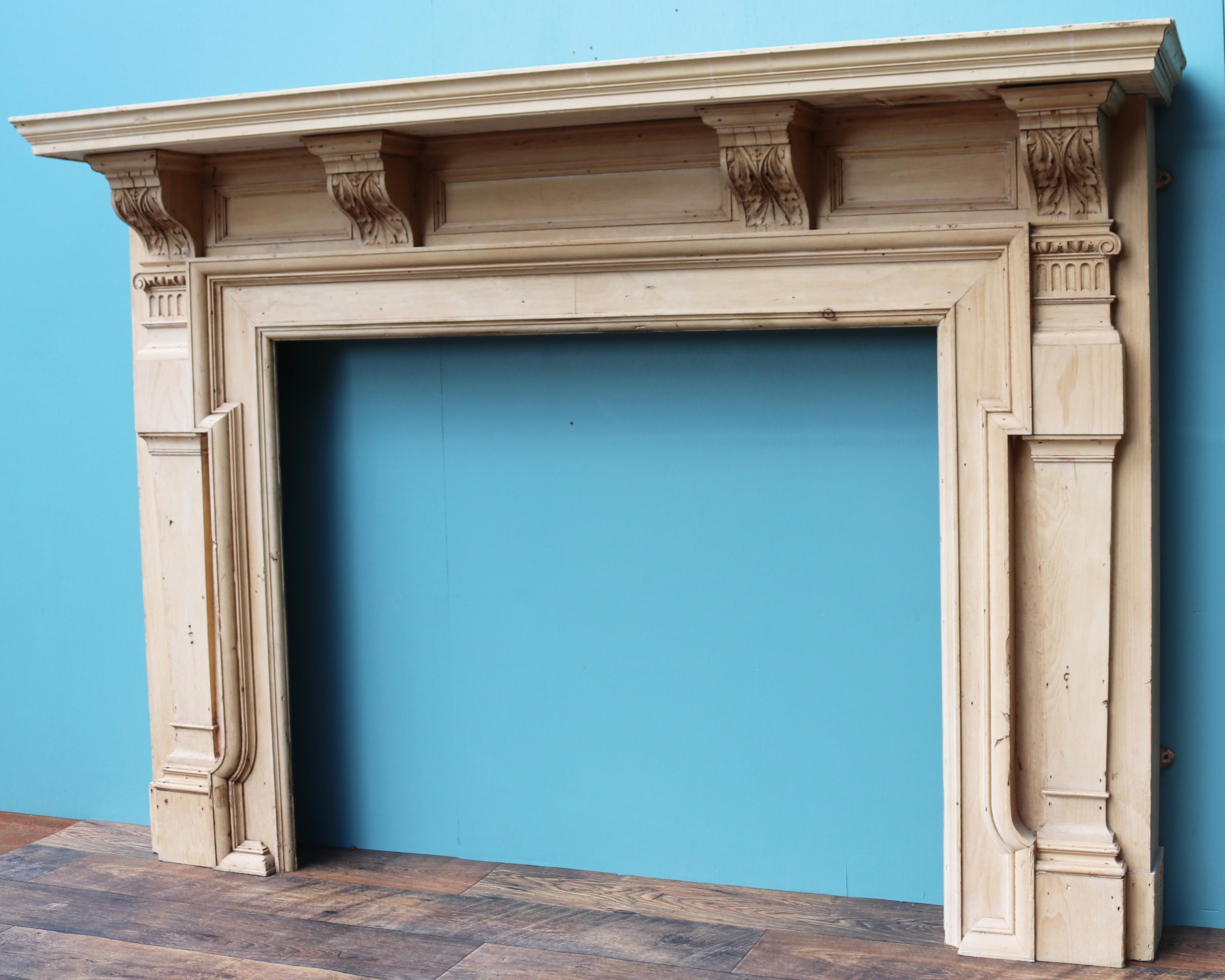An antique, Victorian period fire surround constructed from pine and featuring carved corbels and jambs.

Additional dimensions:

Opening height 86 cm

Opening width 106.5 cm

Width between outside of foot blocks 165 cm

Condition