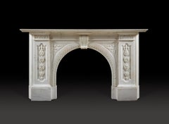A Victorian Chimneypiece of Robust Architectural Form in Carrara Marble