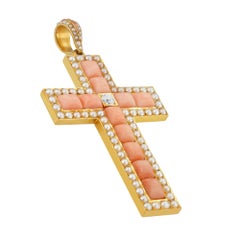 A Victorian coral, diamond and half pearl cross pendant