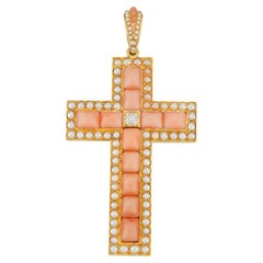 A Victorian coral, diamond and half pearl cross pendant