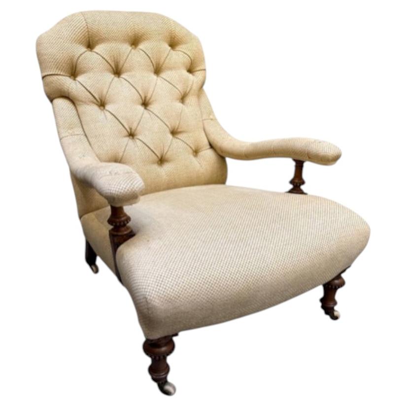 A Victorian Deep Buttoned Back Armchair For Sale