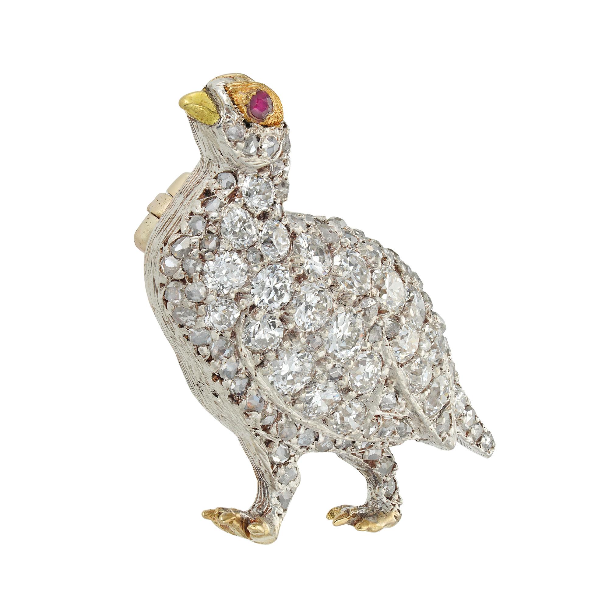 A Victorian diamond set partridge brooch, set throughout with old brilliant-cut and rose-cut diamonds, estimated to weigh a total of 1 carat, with a ruby set to the eye, silver set to a gold mount with a brooch pin fitting, circa 1890, measuring