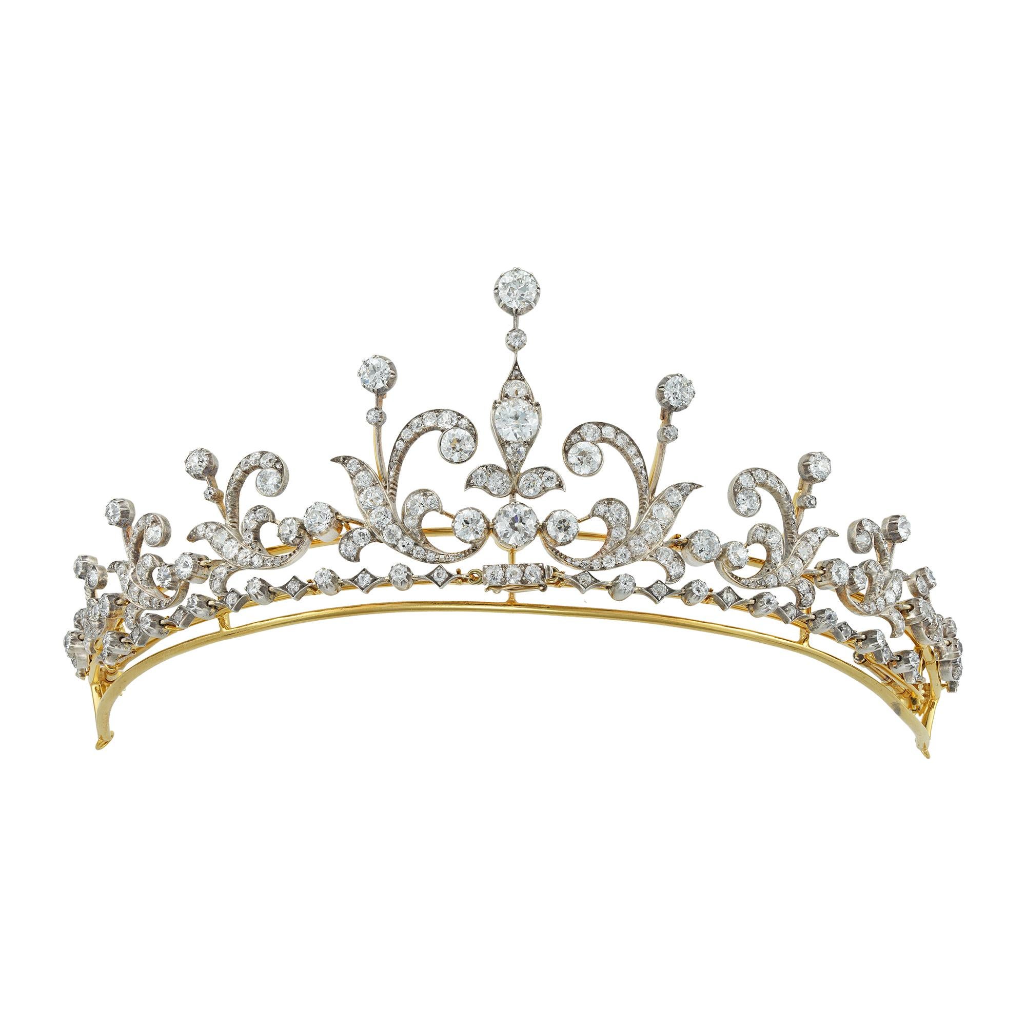 A Victorian diamond-set tiara, to the centre three large old European-cut diamonds, vertically set in a foliate design, to further openwork scroll design sections set throughout with old-cut diamonds estimated to weigh 26 carats in total, all