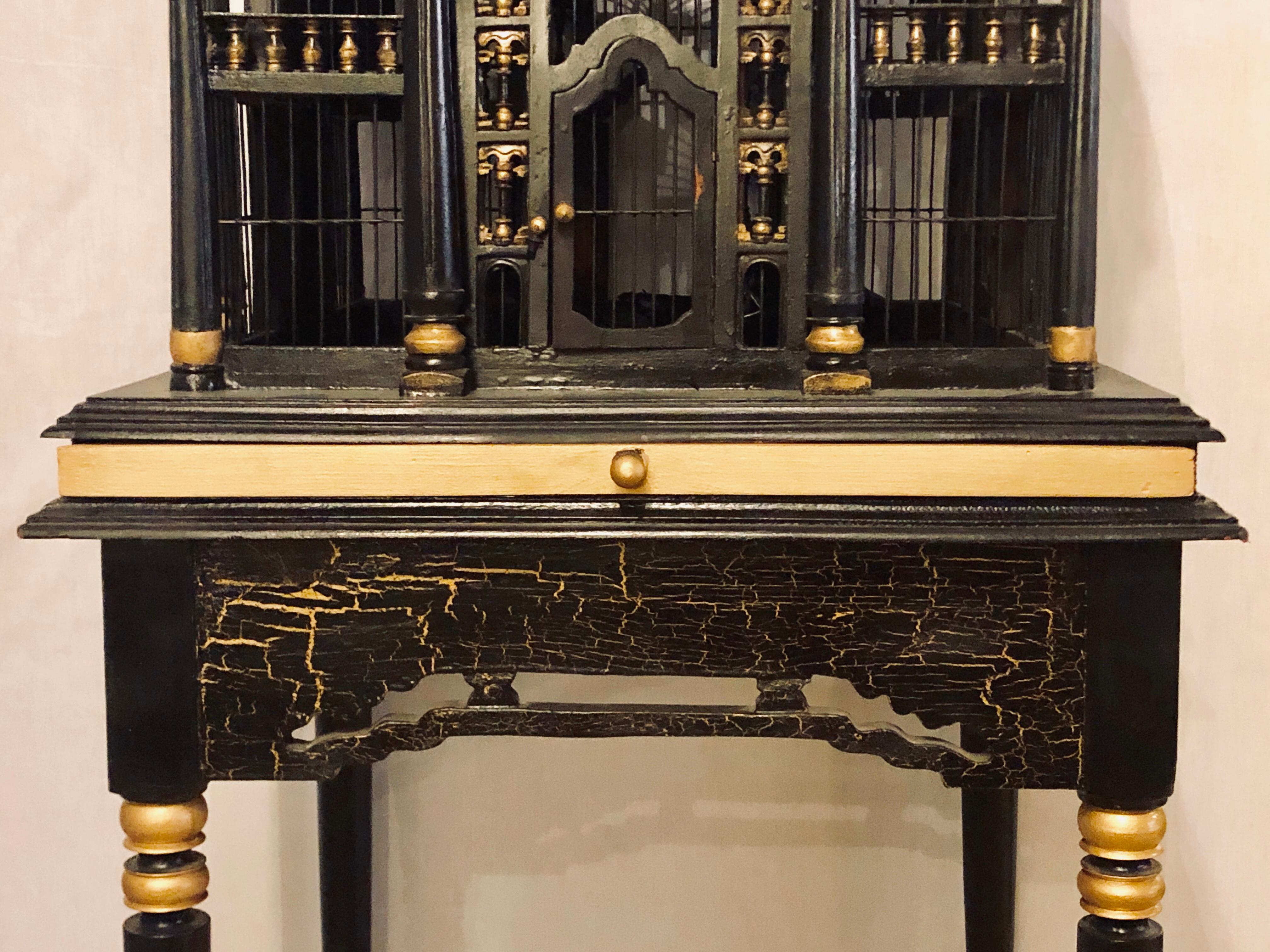 Victorian Ebony and Gilt Faux Marble Decorated Birdcage on a Stand In Good Condition In Stamford, CT