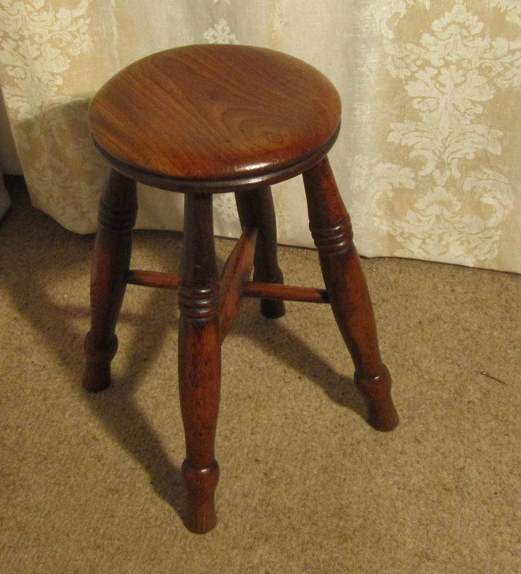 A Victorian elm farmhouse kitchen stool

A lovely country piece with a superb natural color and a gorgeous patina, it has a thick elm seat with a moulded edge to the solid elm top it is also a very useful piece 
The stool is good and sound, it is
