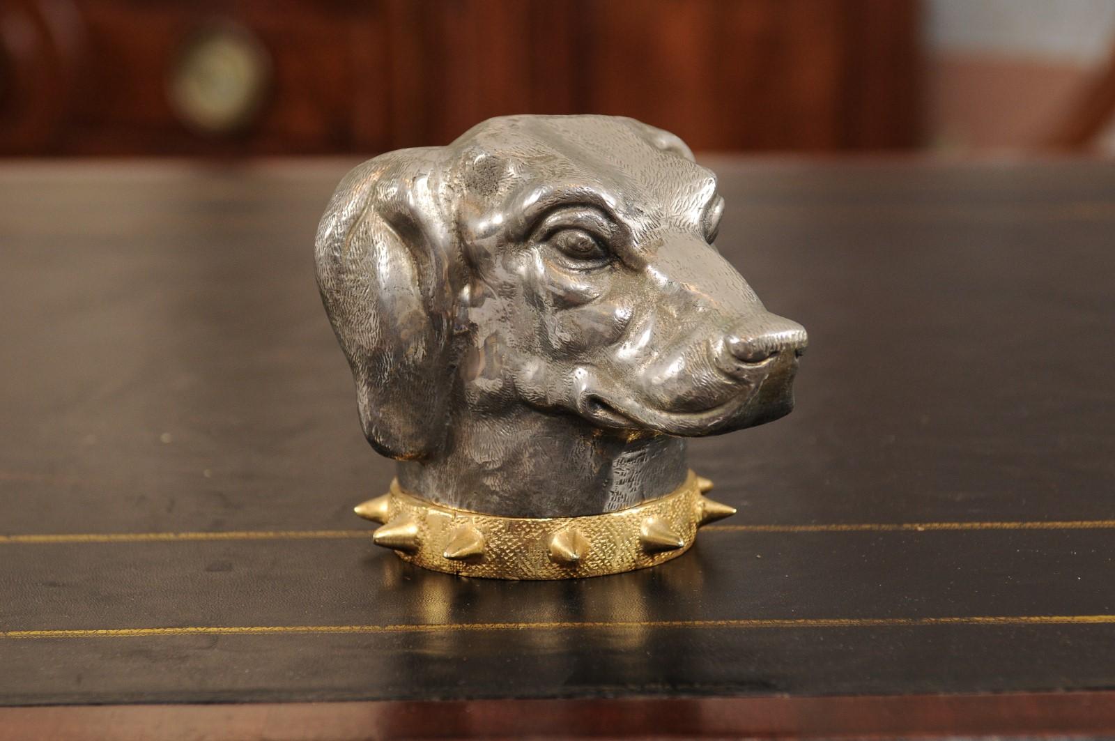 The Victorian cast metal hound dog head cigarette box with spiked collar.